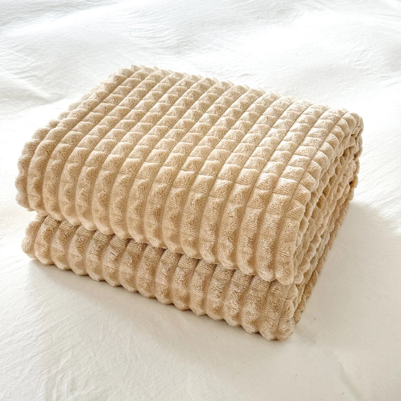 Couleur : Camel - plaid à carreaux en relief plié sur un lit
